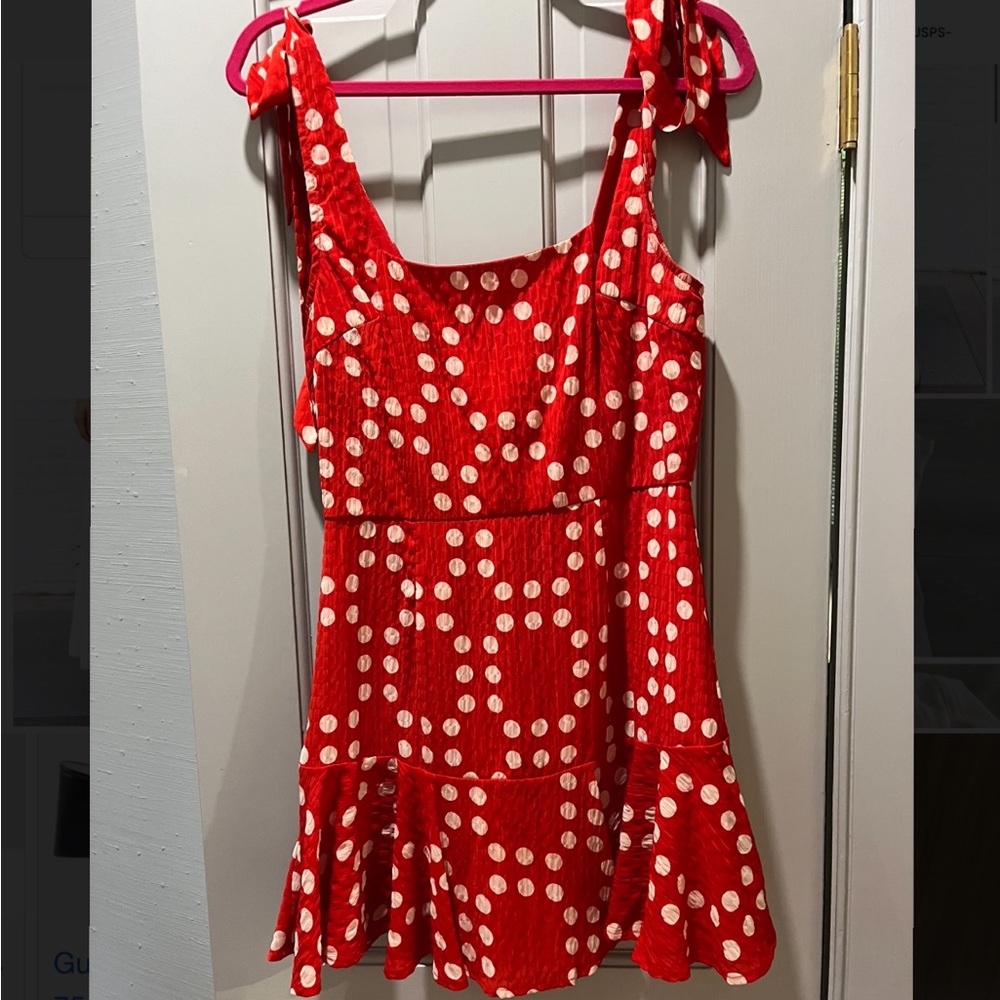 Hemline red and white polka dot dress with tie straps